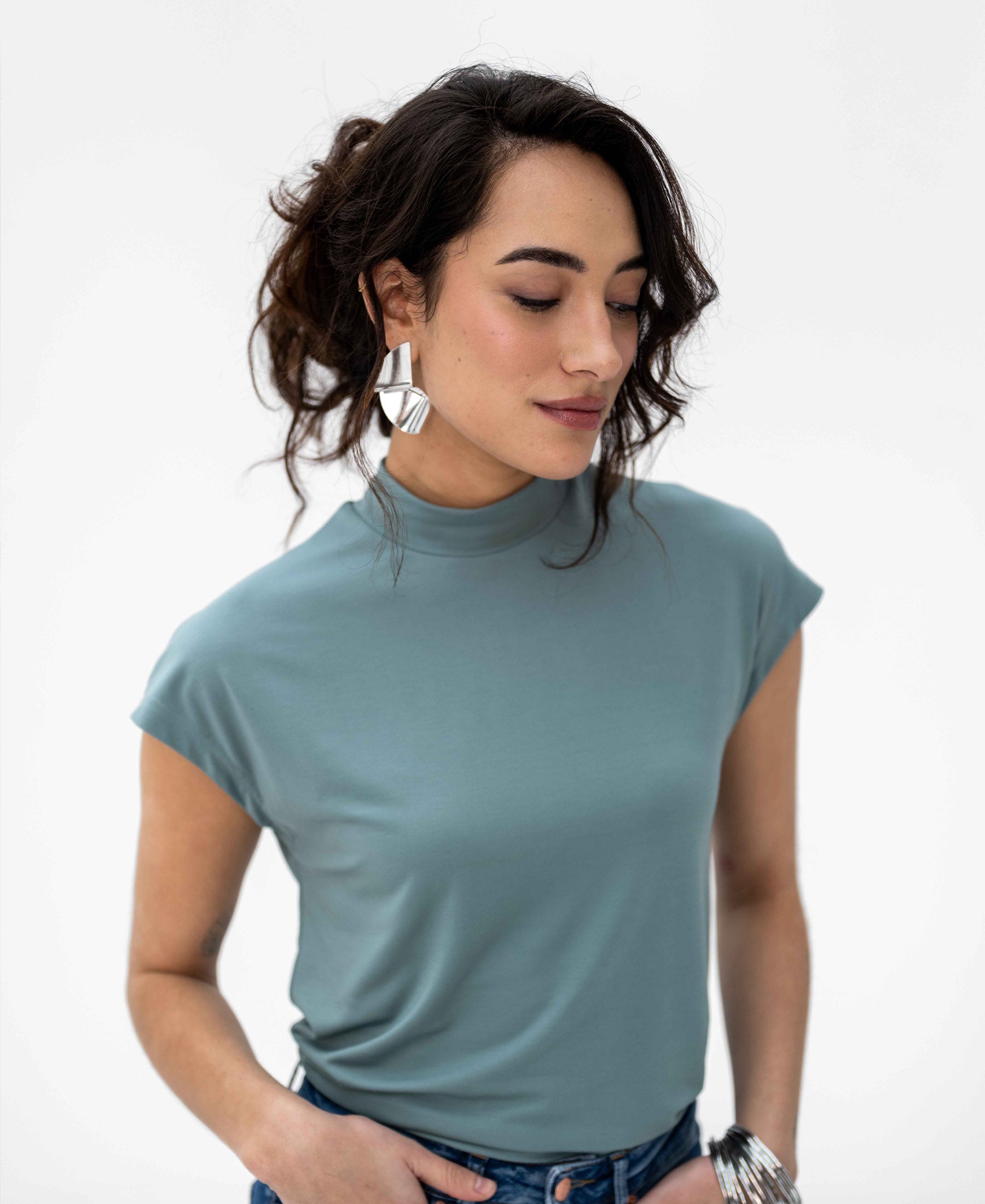 Light green PLEIN PUBLIQUE LA ROMY travel top shown on model against a white background.