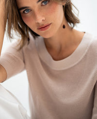 Light sand mesh sweater with silk, shown on model.