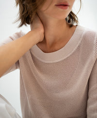 Light sand mesh sweater with silk, shown against a neutral background.