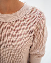 Close-up of the Plein Publique mesh sweater Le Nancy with silk in light sand, showing ribbed collar detail.