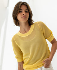 Citron yellow mesh sweater with silk, shown on white background.