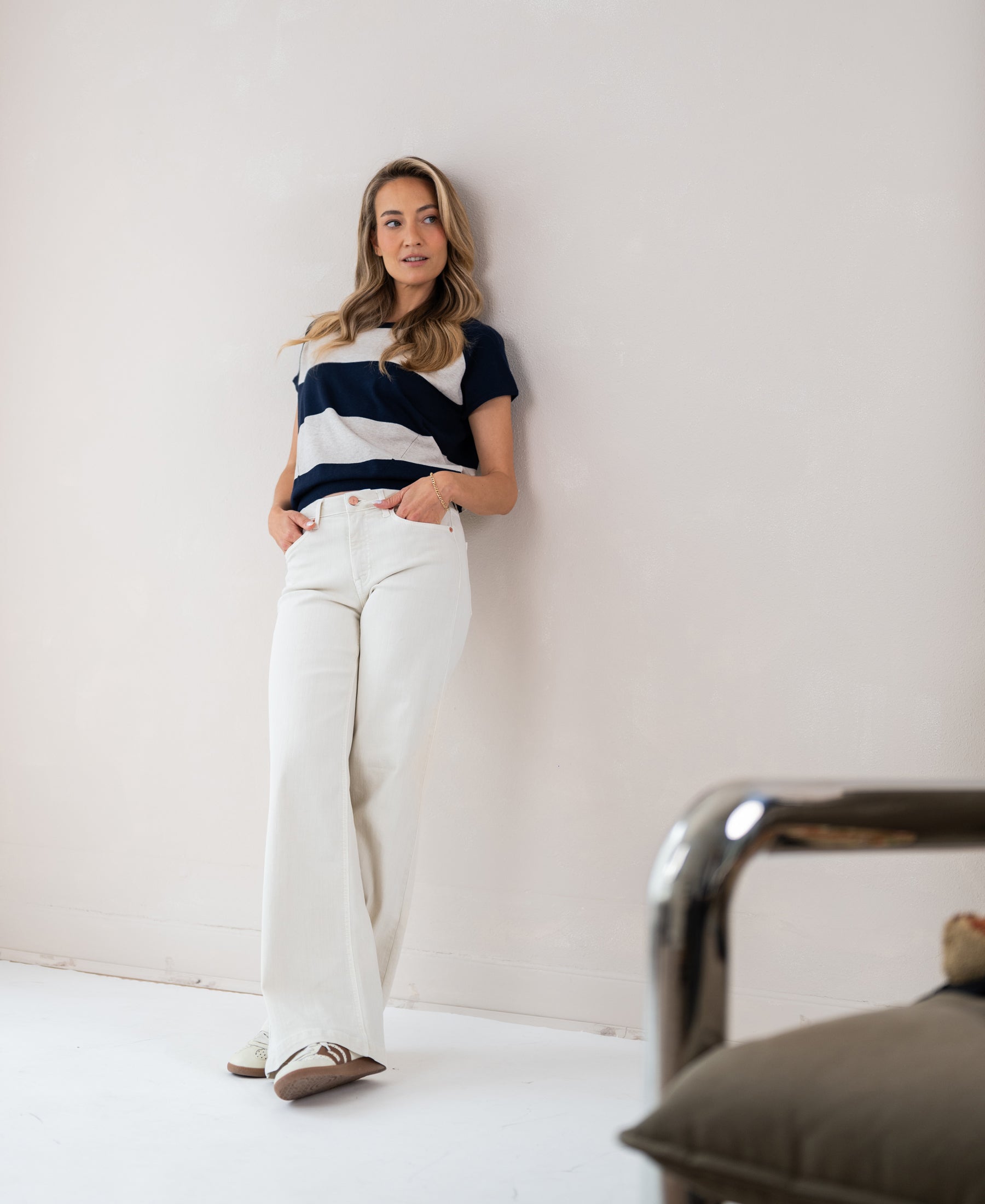 Navy and sand striped sweater by PLEIN PUBLIQUE, seen from the front.