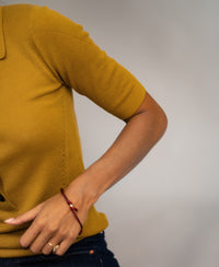 Poloshirt aus Merinowolle LA PANTIN Goldgelb