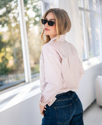 Blouse LA PASCALLE from PLEIN PUBLIQUE shown by large windows in natural light.