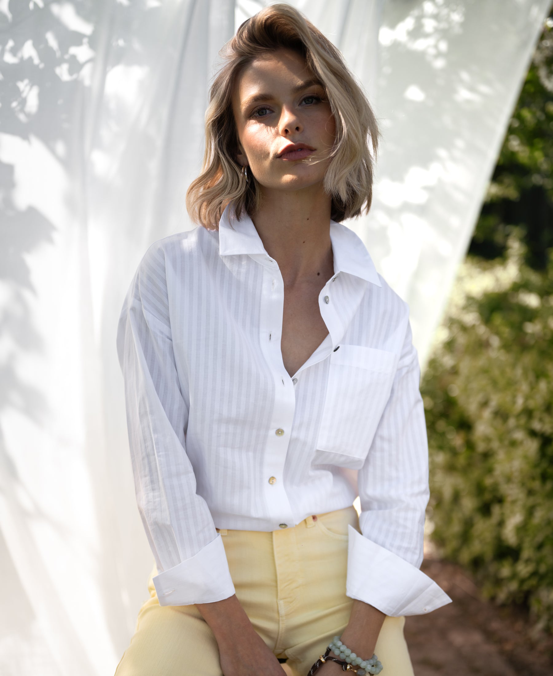 White striped blouse in the PLEIN PUBLIQUE LA PASCALLE style shown from the front.