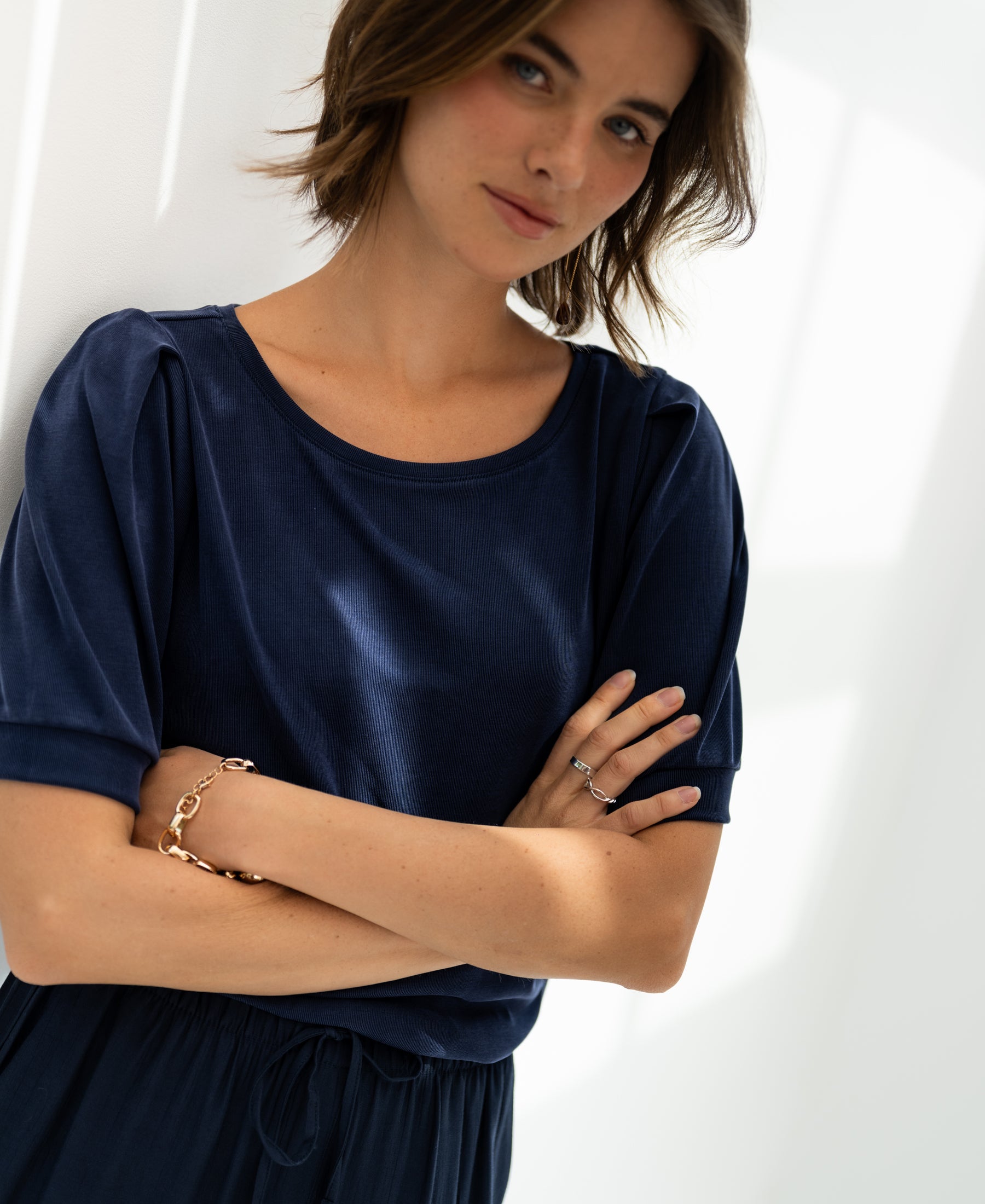 Dark blue ribbed T-shirt LA PHILEINE by PLEIN PUBLIQUE shown in bright natural light.