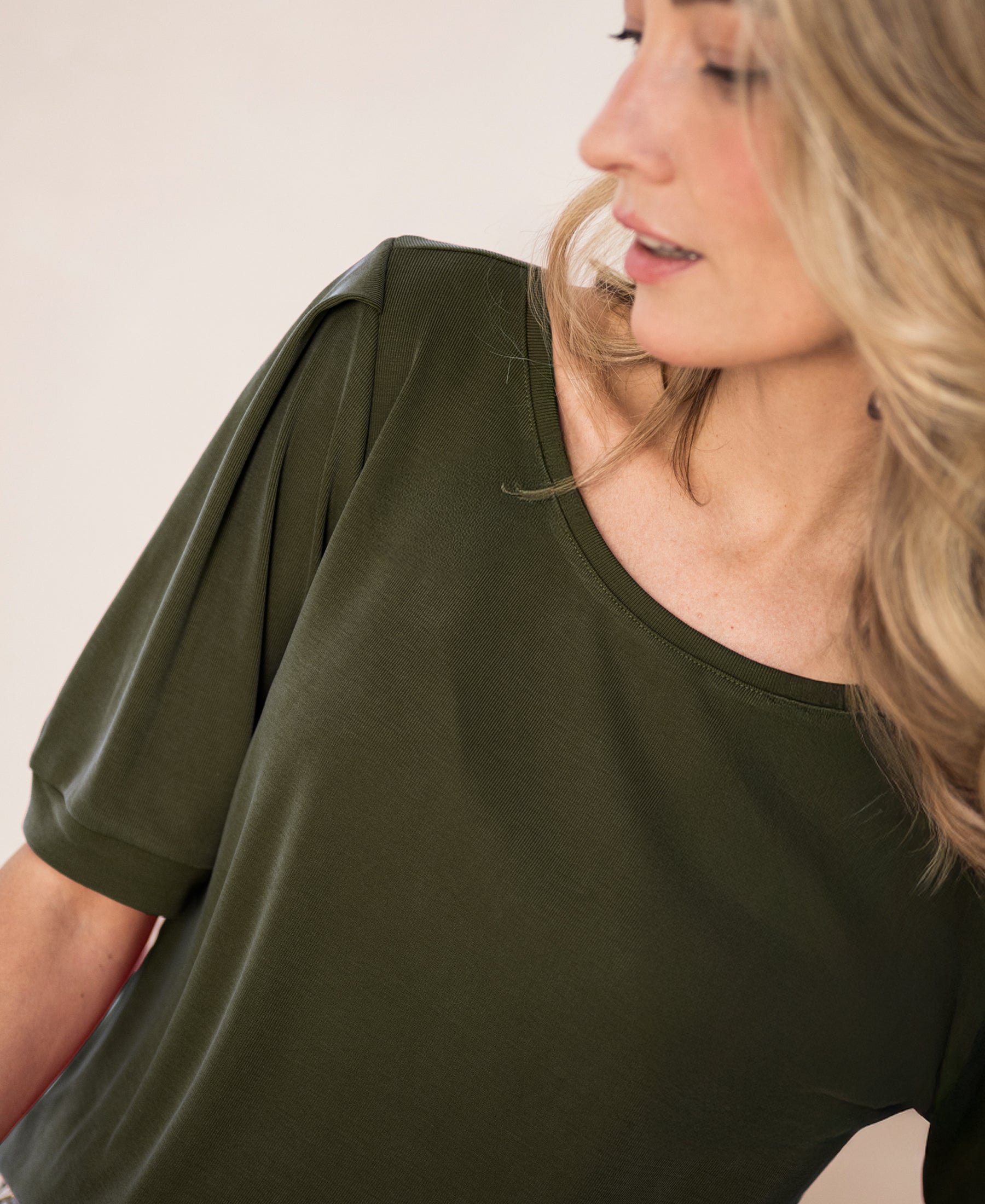 Ribbed olive green LA PHILEINE T-shirt by Plein Publique, shown from the right side.