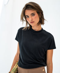 Charcoal ribbed collared top LA PIERRE by PLEIN PUBLIQUE, shown on a woman with short brown hair, on a white background.