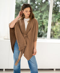 Camel-colored merino wool poncho from PLEIN PUBLIQUE.