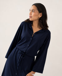 LE RAPHAEL dark blue button-front dress with kimono sleeves from PLEIN PUBLIQUE.