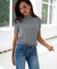 Ribbed collared top with white and black stripes.