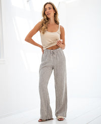 Striped linen-blend pants in anthracite by Plein Publique, shown in a bright room.