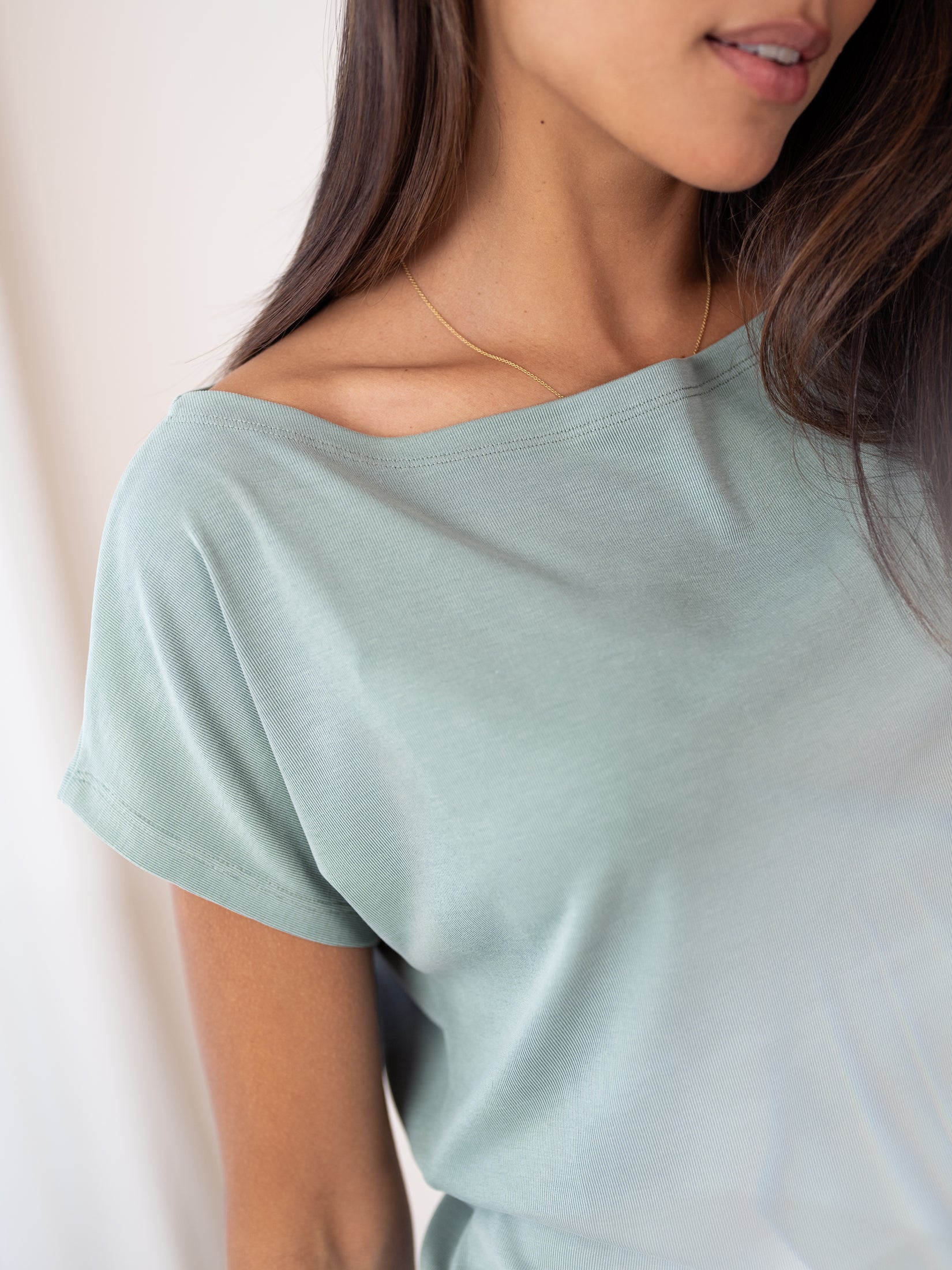 Light mist green ribbed boat-neck T-shirt from PLEIN PUBLIQUE LA SOMME, shown on a woman.