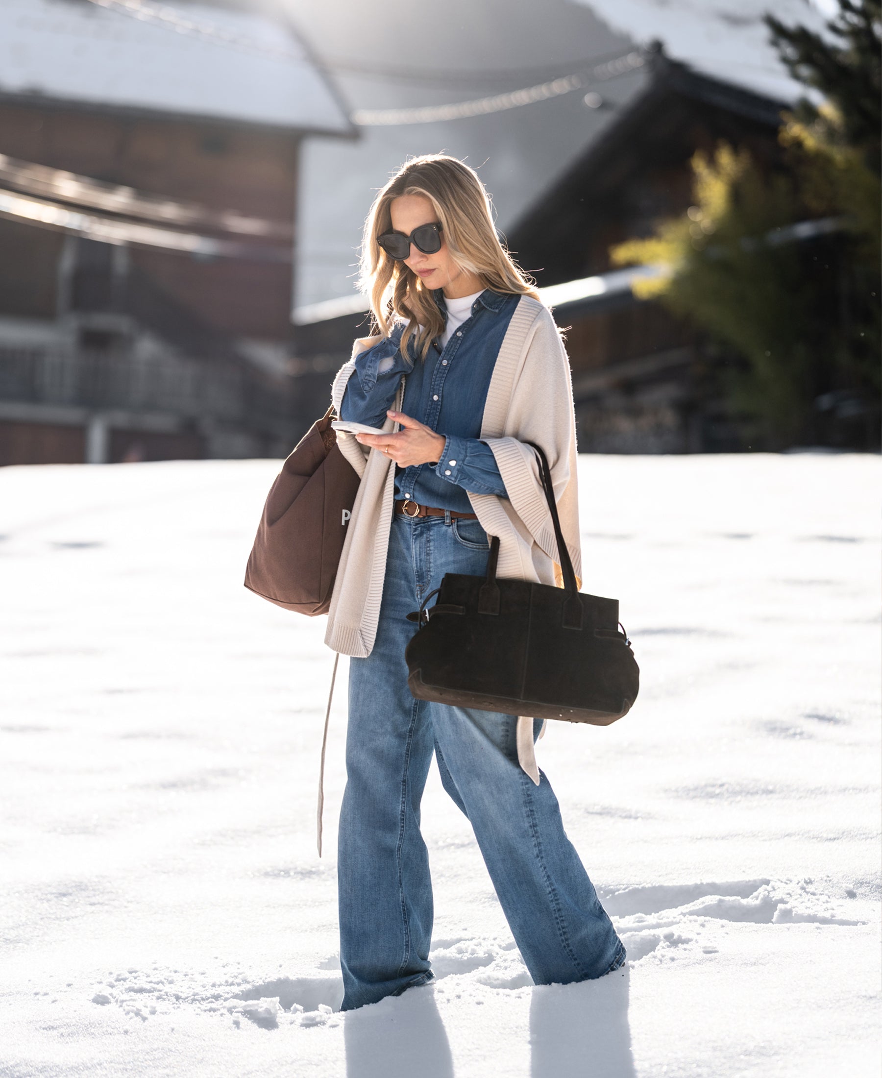 Light stone wide-leg jeans by Plein Publique, shown worn outdoors on snow.