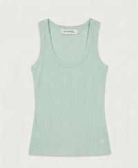 Pastel green luxe & soft top with scoop neck and small white heart near the hem.