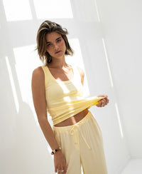 Luxe & soft LA TOULON light yellow top by PLEIN PUBLIQUE, shown in sunlight, front view.
