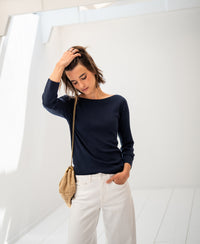Dark blue Tencel-silk boat neck sweater, shown on a woman.
