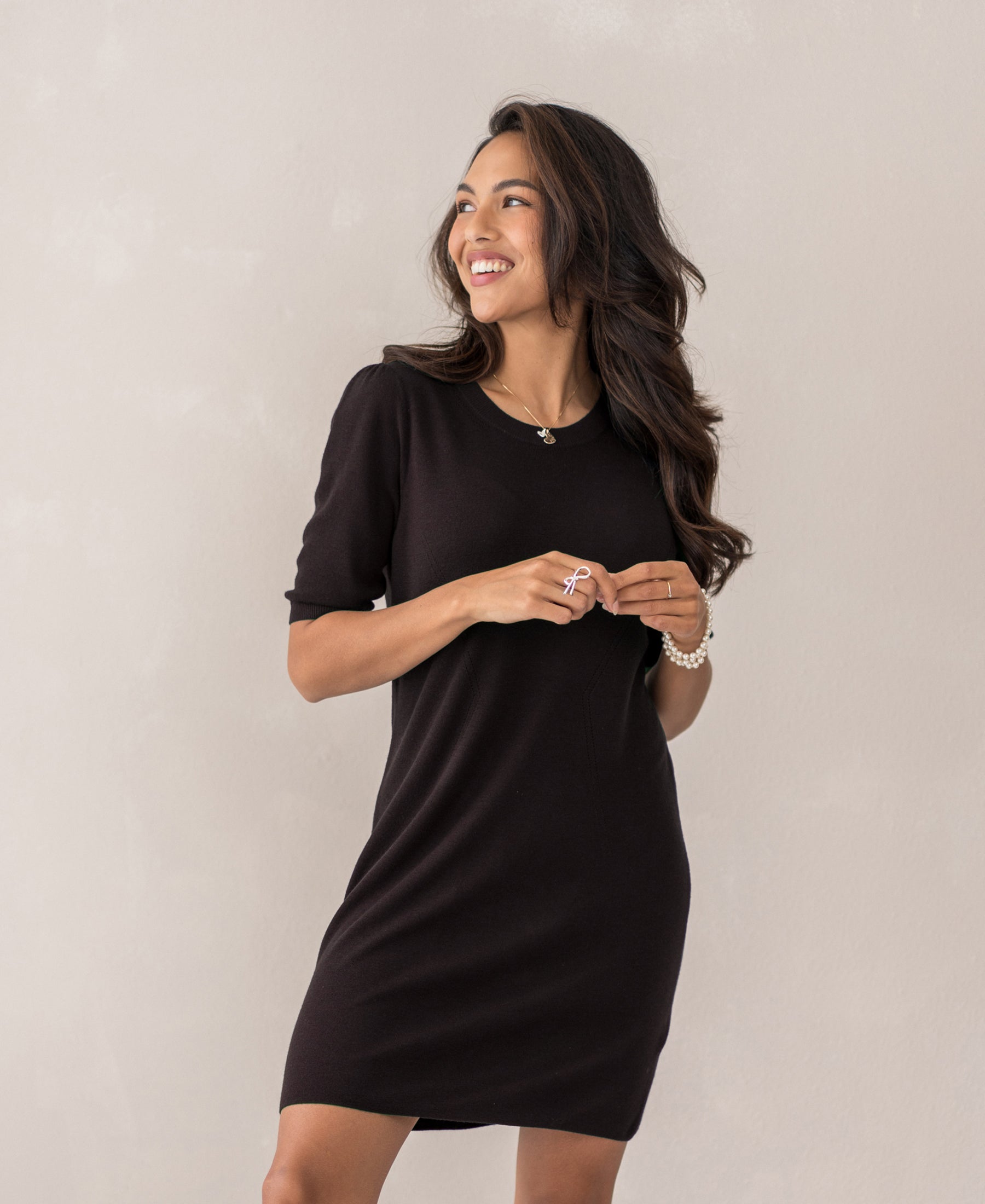Chocolate brown merino wool dress LA TWIGGY by PLEIN PUBLIQUE, shown from the side against a light background.