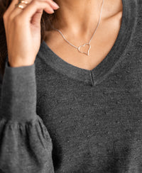 PLEIN PUBLIQUE Merino wool V-neck sweater in anthracite, front view.