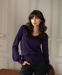 PLEIN PUBLIQUE Merino wool V-neck sweater LA VICTORIA in dark violet, shown indoors.