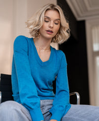 PLEIN PUBLIQUE Merino wool V-neck sweater in sea blue.