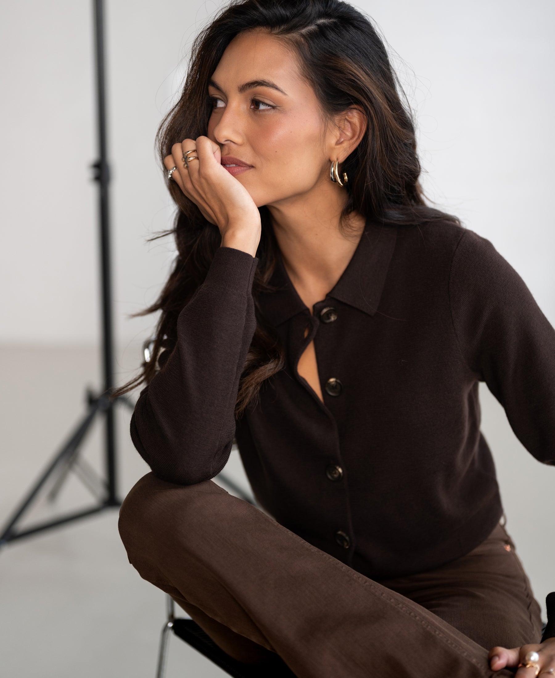 PLEIN PUBLIQUE Pure Choco brown polo collar vest, shown on a woman with long dark hair, side view.