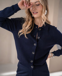 Navy blue PLEIN PUBLIQUE polo-collar cardigan LES VINGT shown on model.