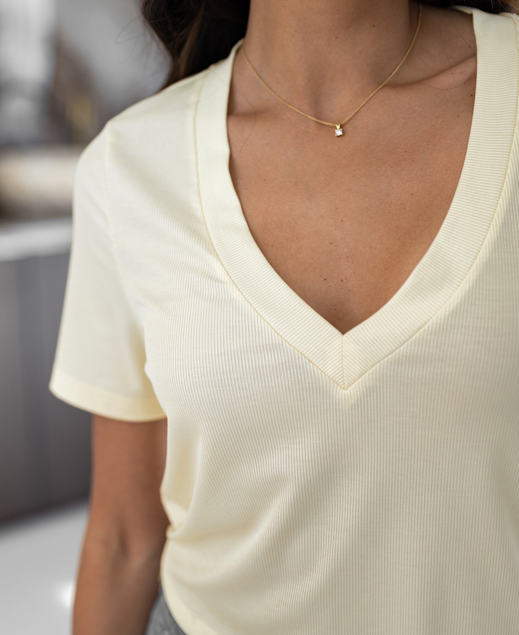 PLEIN PUBLIQUE Lyocell T-shirt in soft yellow, shown from shoulders to waist.