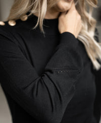 Black and gold PLEIN PUBLIQUE LA CLIQUE Merino sweater.