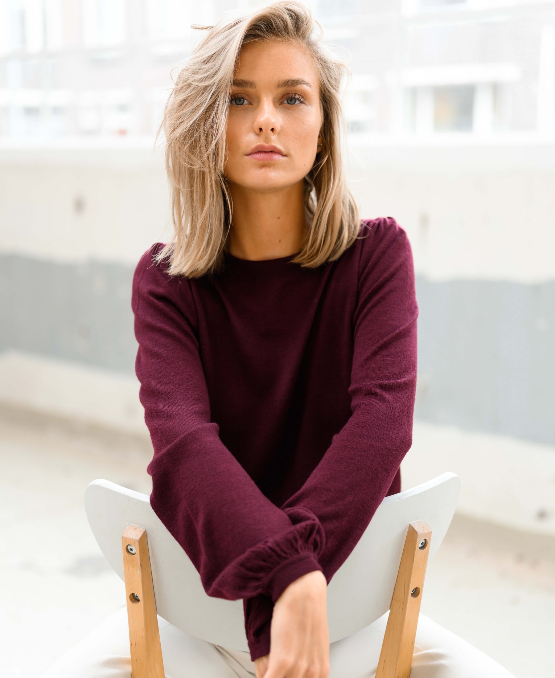 Wine red LA COEUR sweater by PLEIN PUBLIQUE shown from the front.