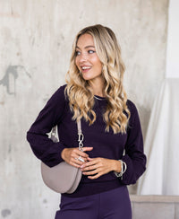 Dark violet sweater with elegant balloon sleeves.